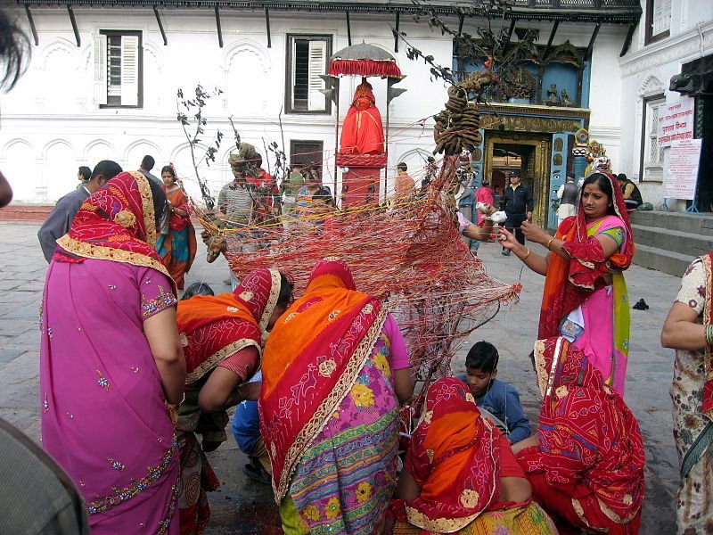 Womenfolk preparing bonfire for the Holika Dahan spring festival in Kathmandu, Nepal