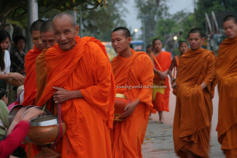 Laotian monks receiving alms