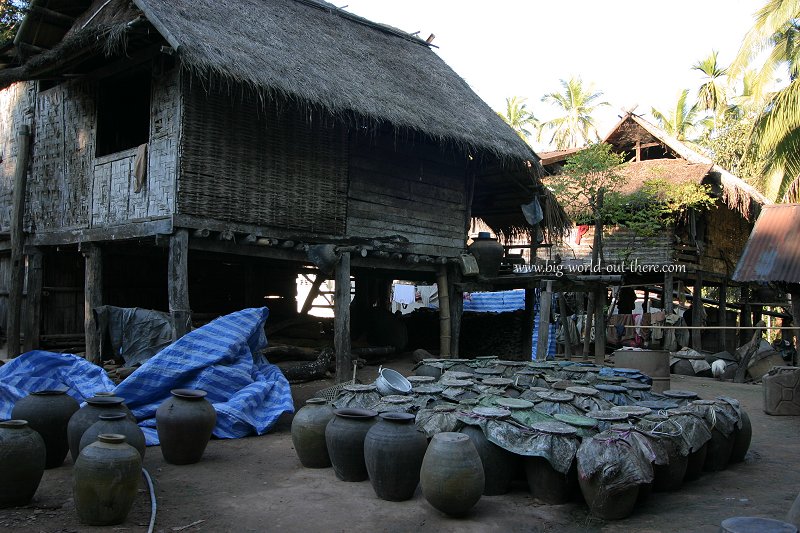 Brewing Lao whisky, in a village near Luang Prabang, Laos