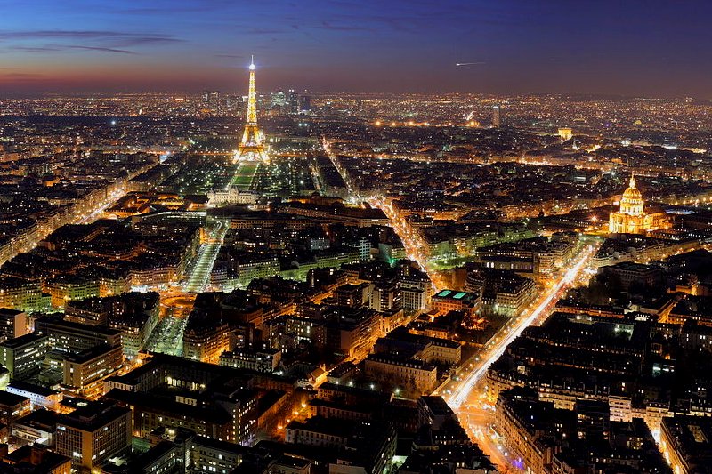 Paris lighting up at night