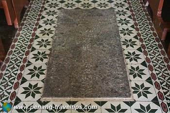 Grave stone embedded on the floor of the St Anne Shrine