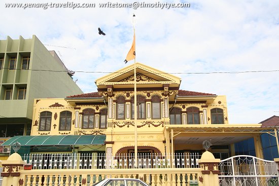 View of Khalsa Dharmic Jatha with its flagpole