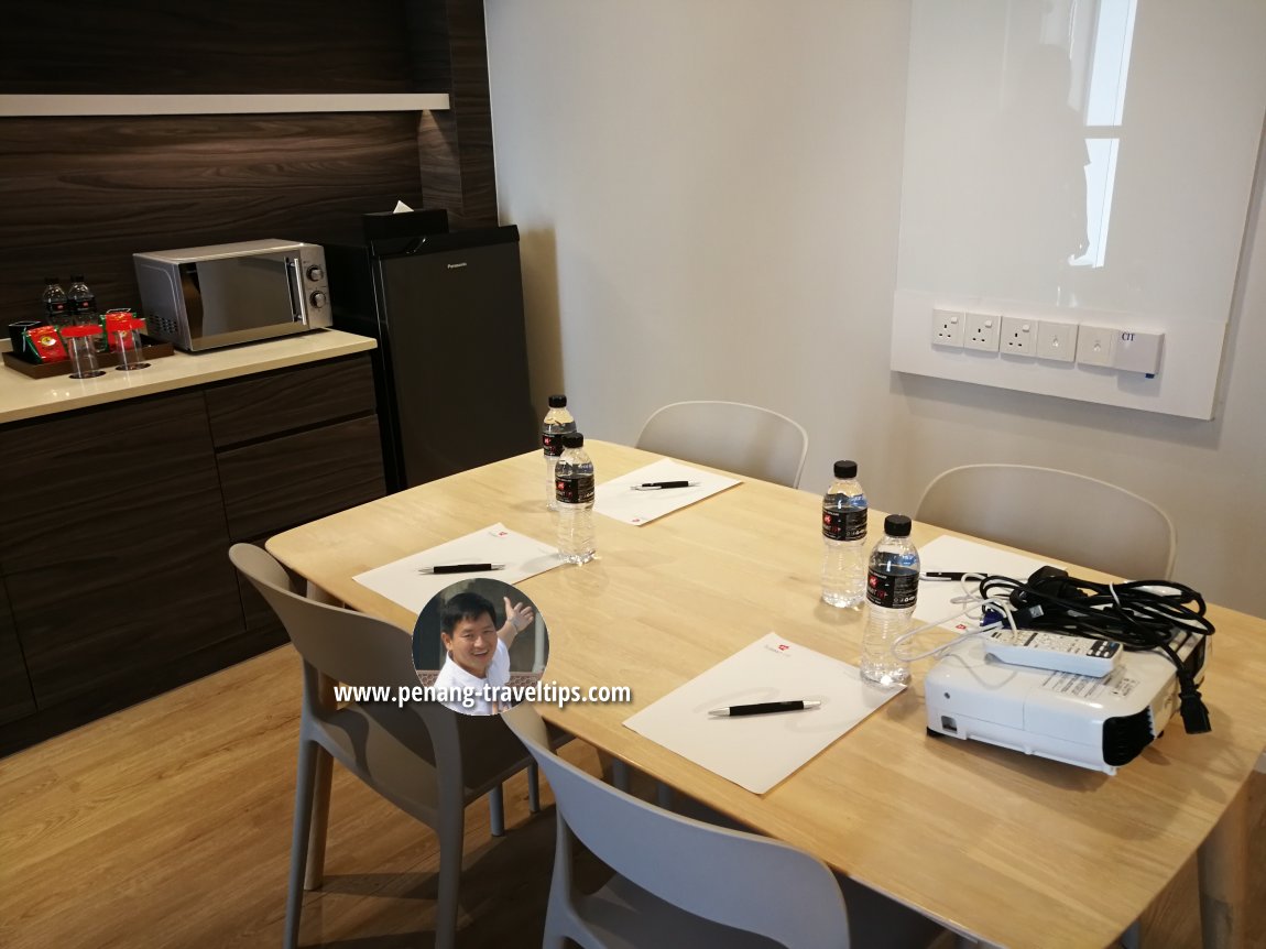 Work table and kitchenette, Serene Suite, The Granite Luxury Hotel