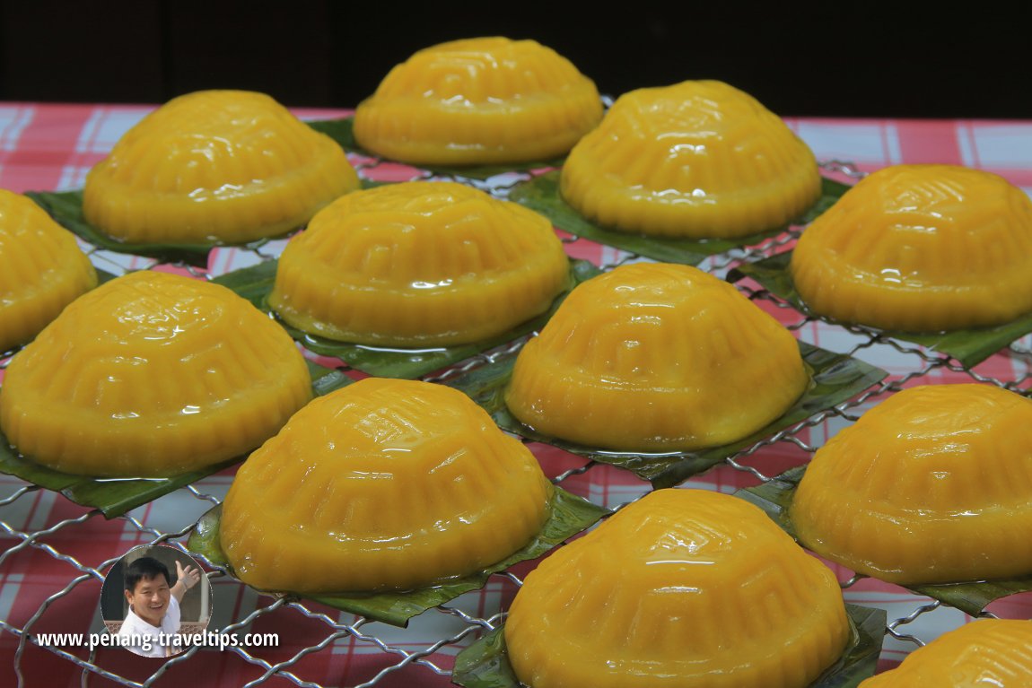 Soft, golden-colour Pumpkin Ang Koo fresh from the steamer