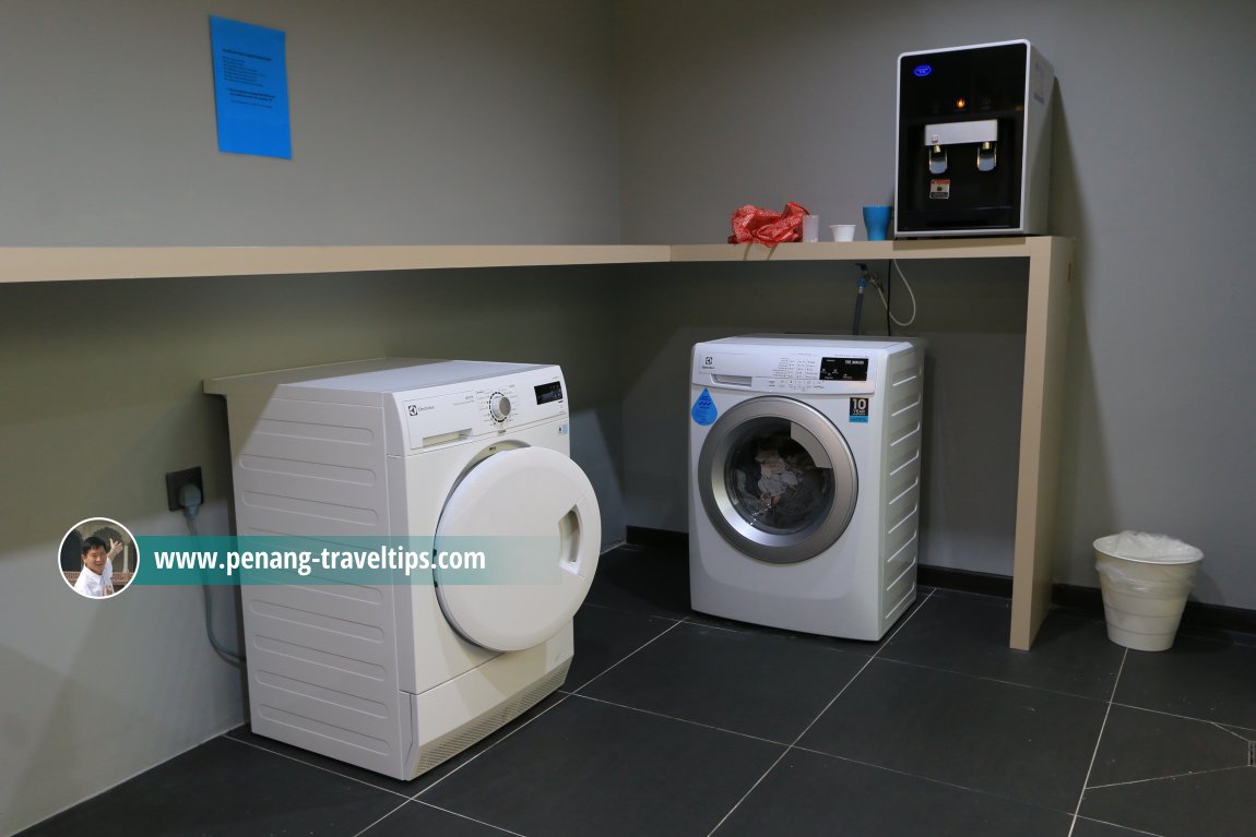 Laundry room at Tropics Eight Suites