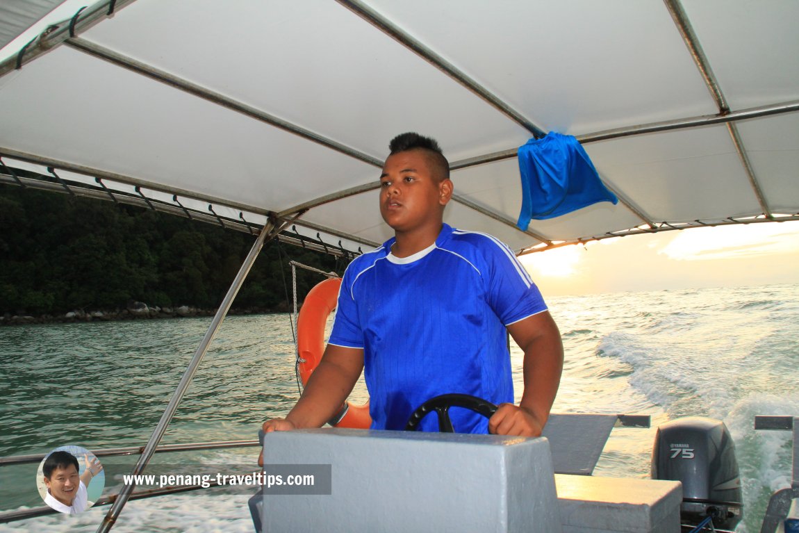 My boatman at the Penang National Park was a boy with a mohawk hair cut