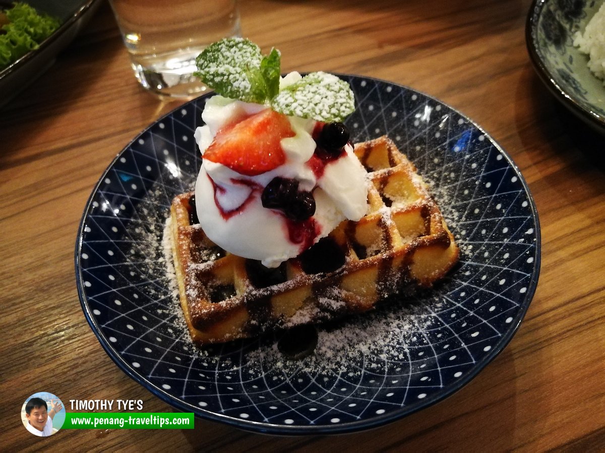 Waffle with ice cream at Areca Cafe