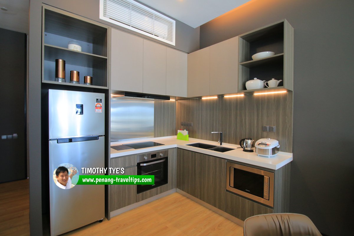 Fully fitted kitchen of residential unit, City Of Dreams