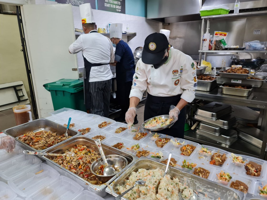 Chef preparing meals in conjunction with Chef's Day 2021