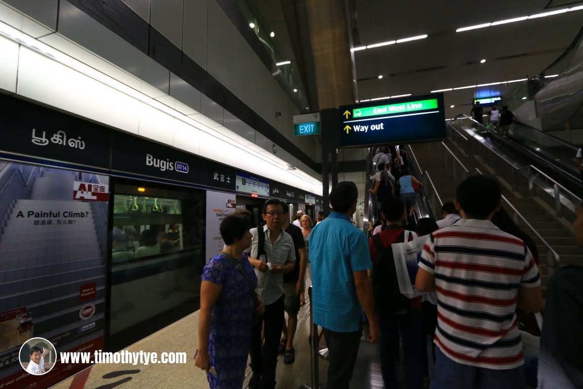 Passengers taking the escalator from platform level of Bugis MRT Station