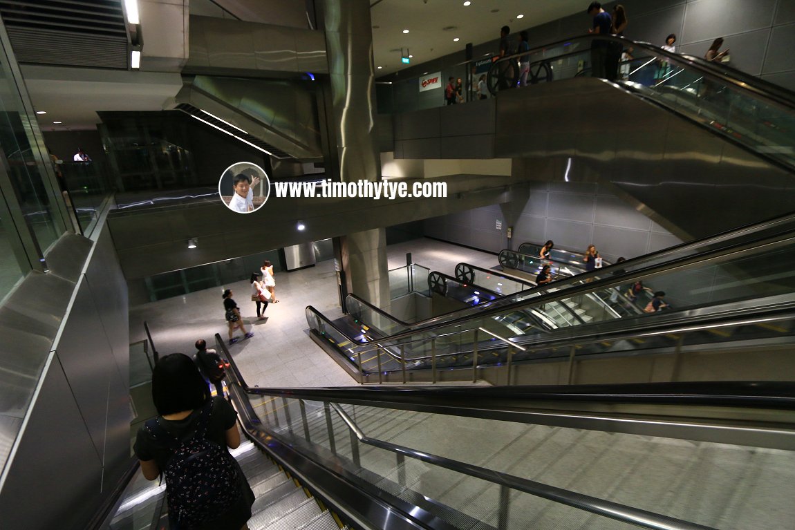 Escalators to platform level at Esplanade MRT Station