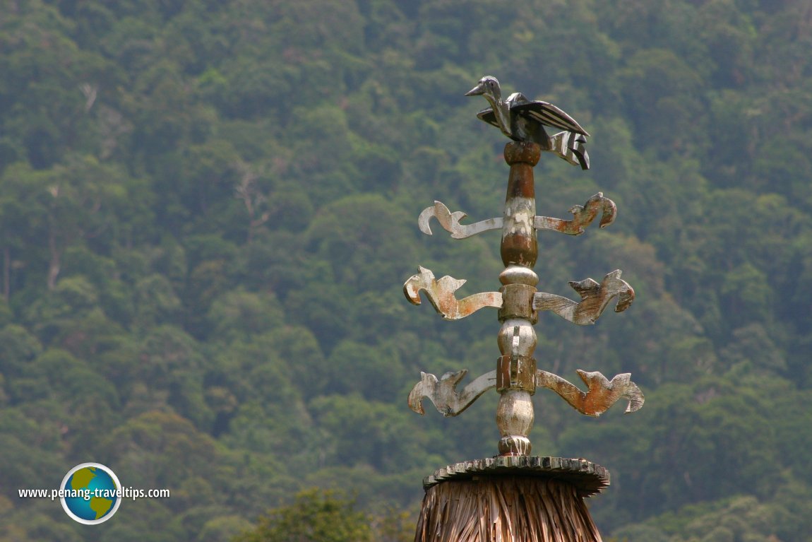 A hornbill crest tops the Bidayuh longhouse