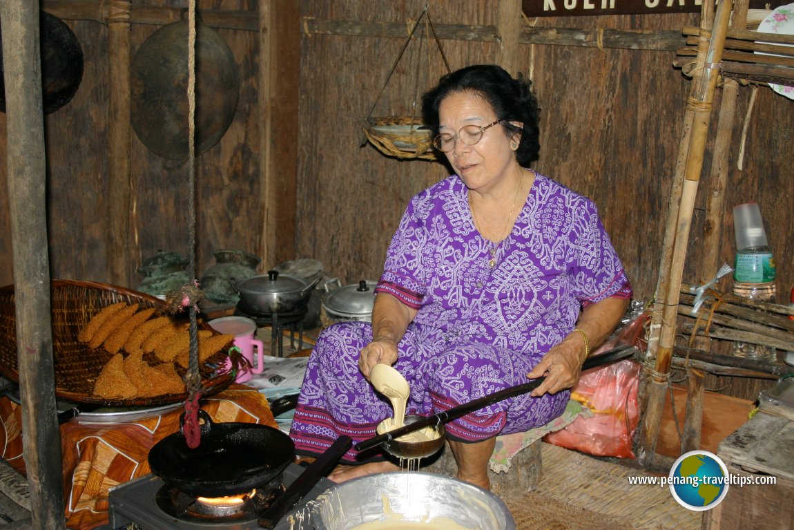 Iban woman making kuih karas