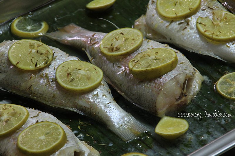 Baked fish in the baking tray