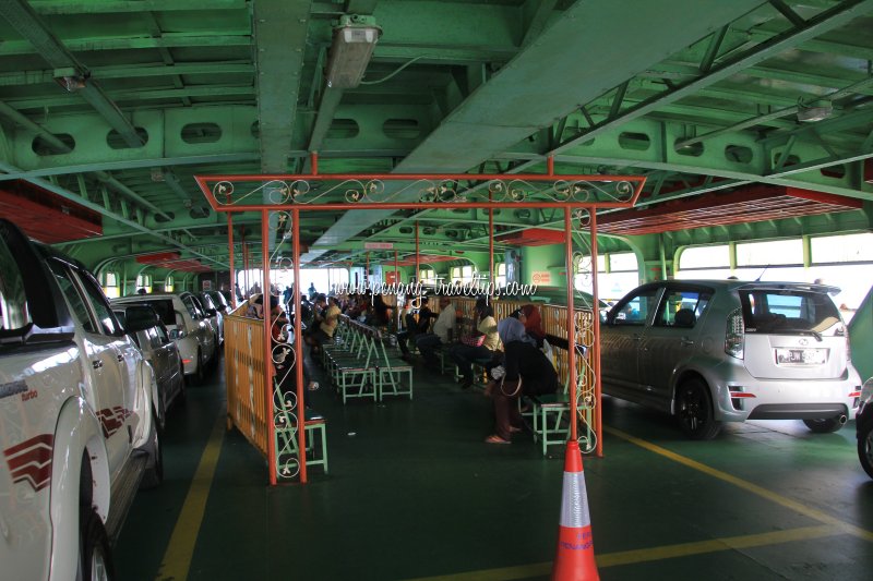 Cars and passengers sharing deck space