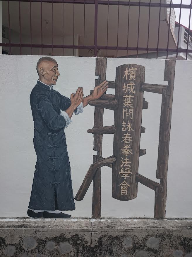 Ip Man demonstrating Wing Chun movies with wooden dummy