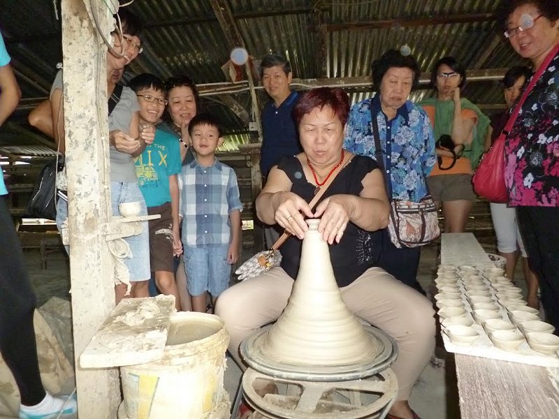 Participant learning to make pottery