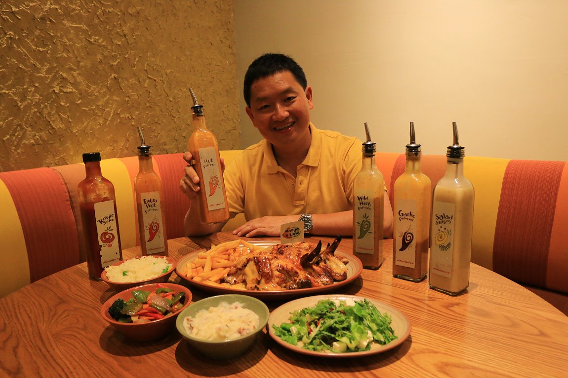 Nando's new Mango & Lime Chicken, with its accompanying dishes