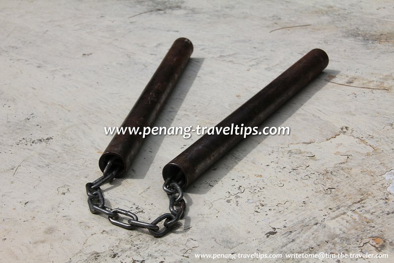 Old rusted steel nunchucks