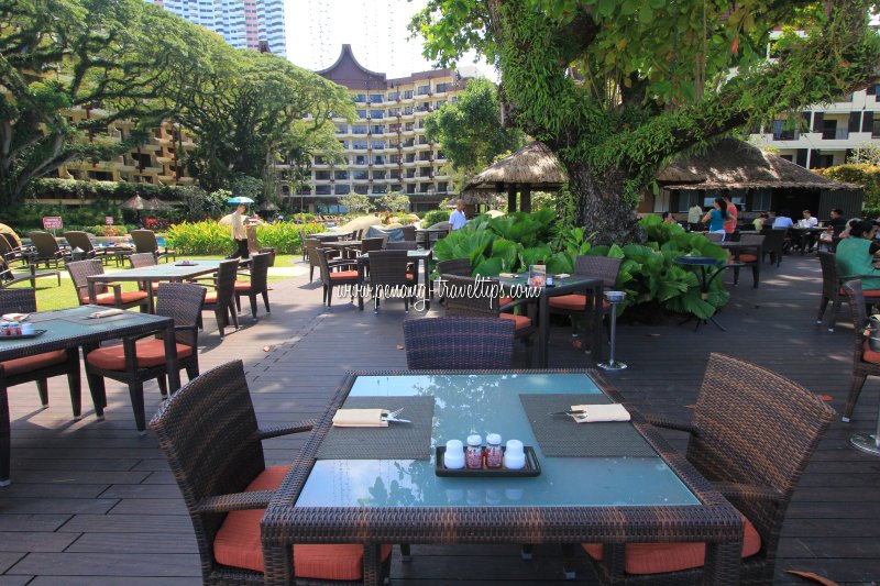 An open-air restaurant at the lanai of Rasa Sayang Resort