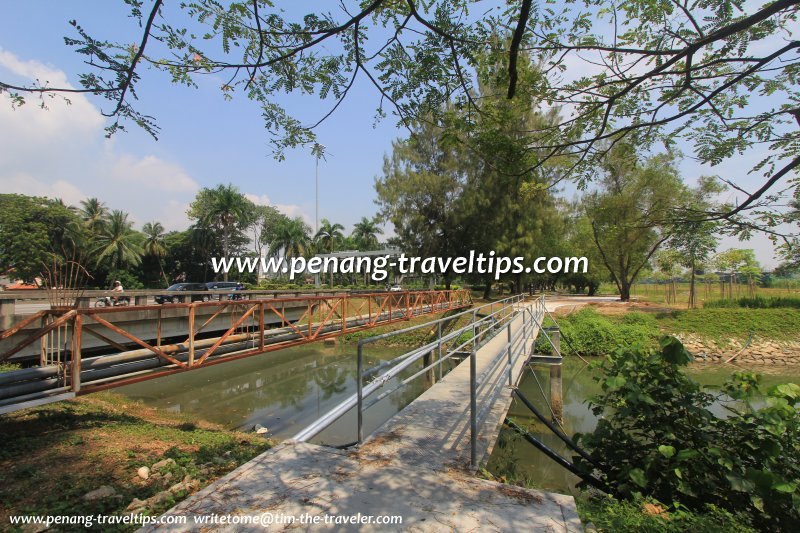 Pedestrian bridge across Sungai Gelugor at The Light Waterfront Linear Park