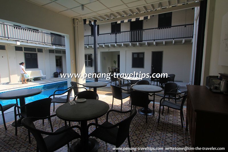 Poolside dining area, Noordin Mews