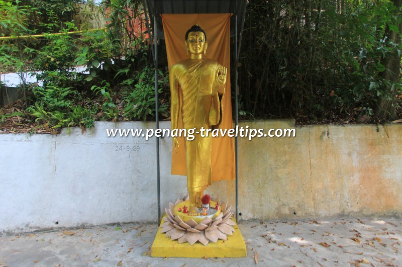 A standing Buddha at Kuan Yim See