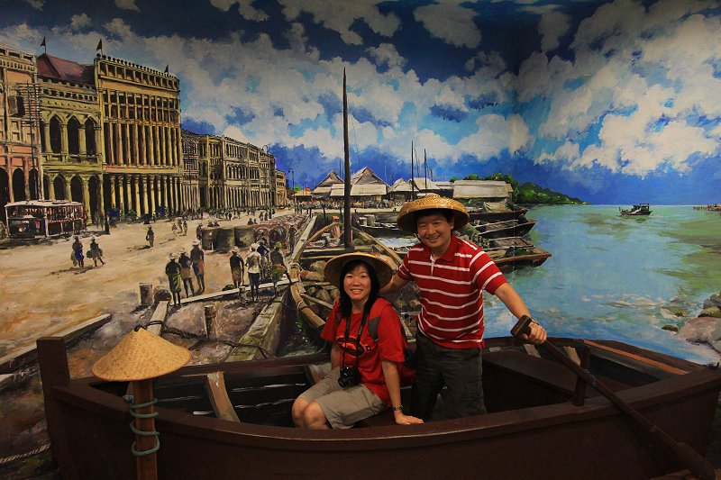 Tim and Chooi Yoke at early 20th century George Town waterfront