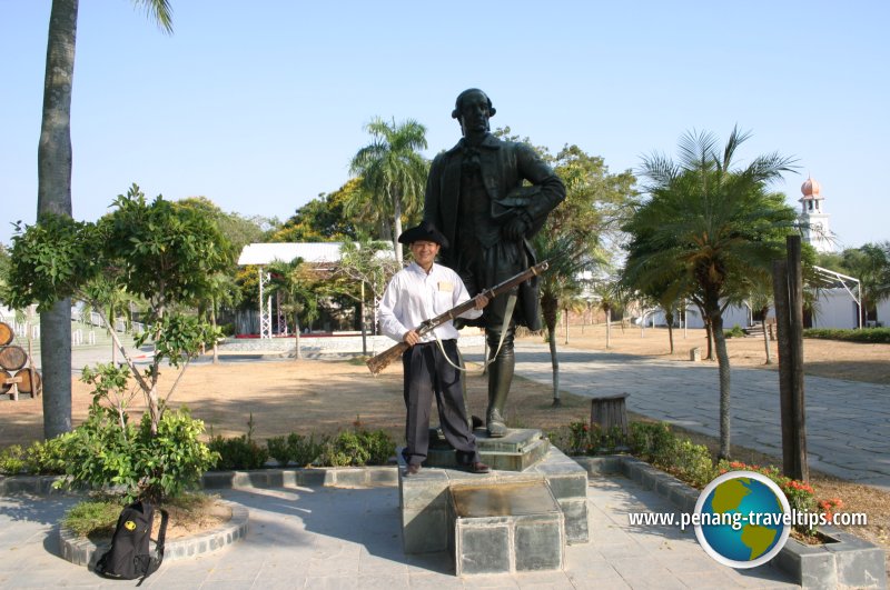 Timothy Tye with Francis Light's statue