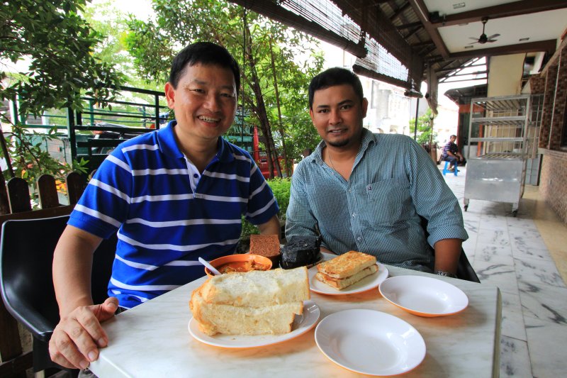 Timothy Tye with Mr M at Maliia Bakery