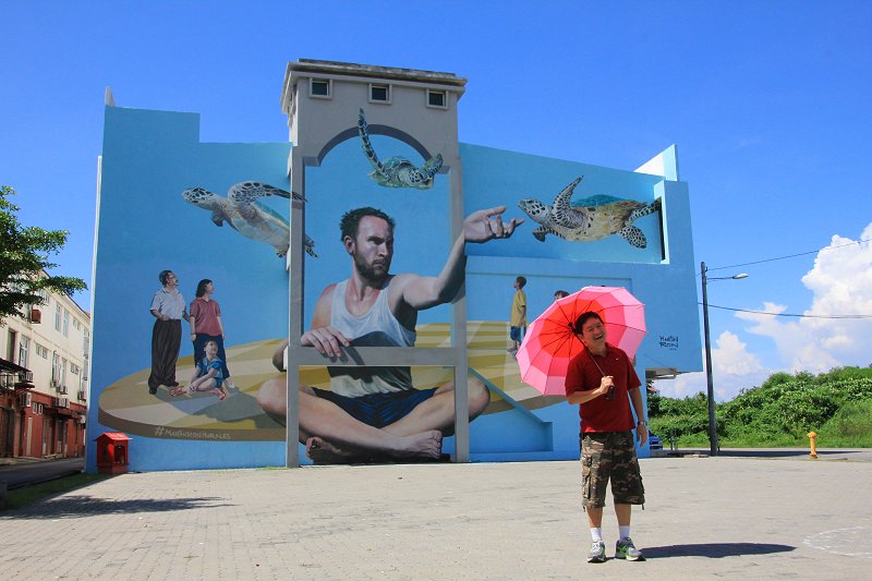 Timothy Tye with the Man & Turtles Mural