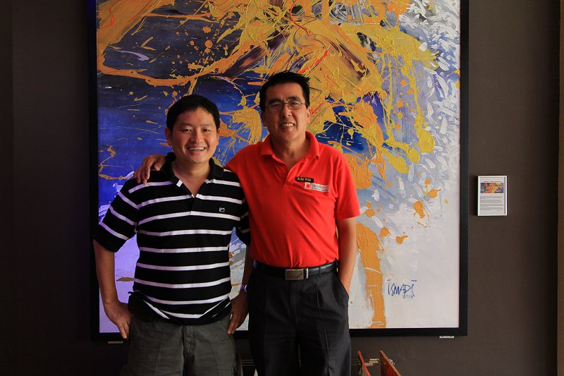 Timothy Tye with Alan Yeoh, the manager of Apollo Inn