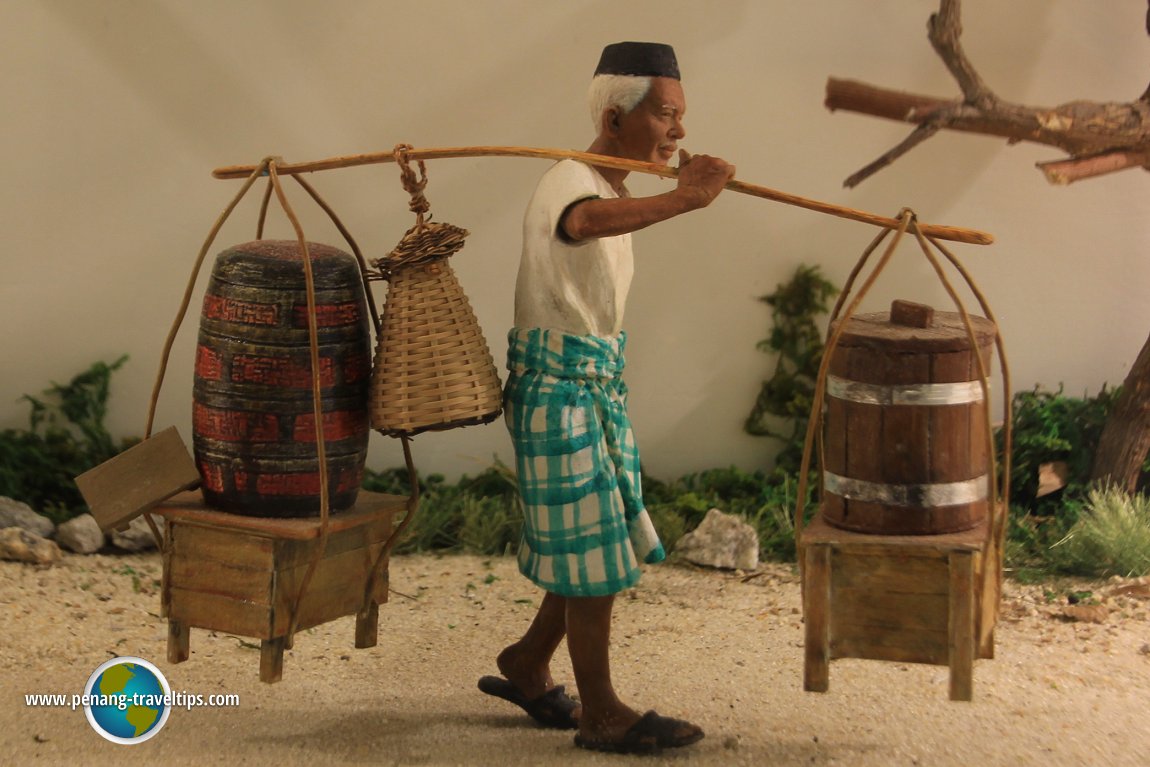 Hawker carrying food with kandar