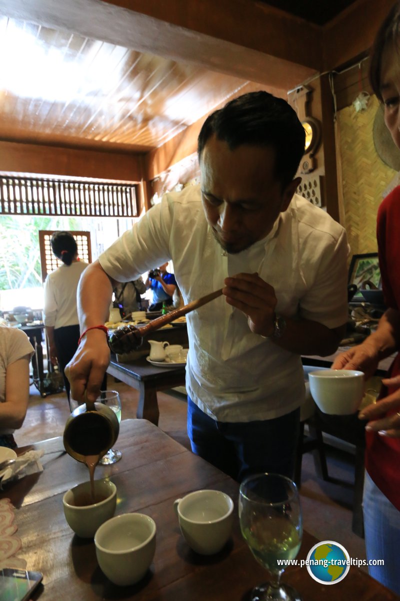 Chef Sau preparing a cocoa drink for us