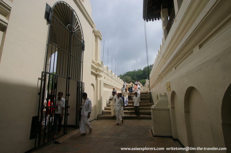 Visitors exiting the Tooth Relic Temple