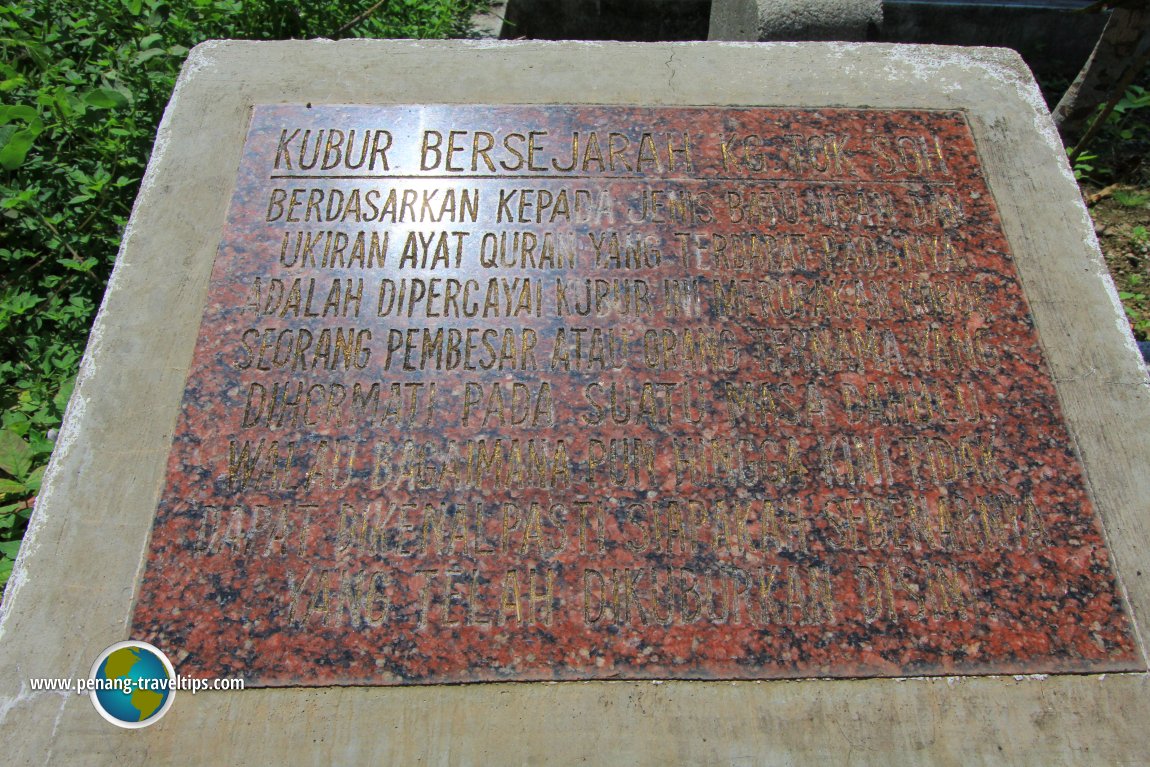 Interpretive plaque at the historic grave at Kampung Tok Soh
