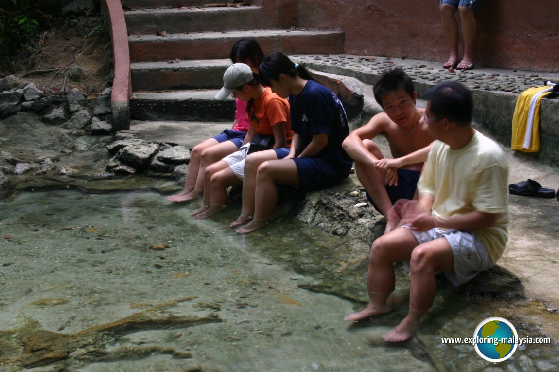 Dipping feet into the natural spring water