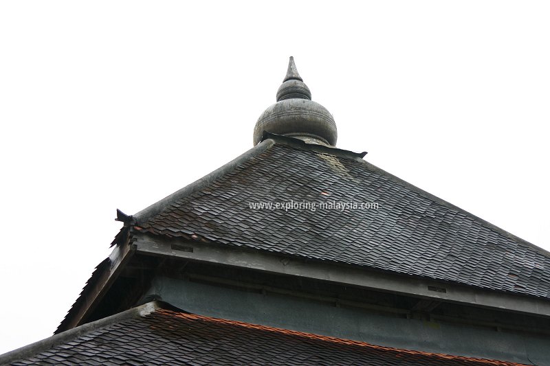 The roof of Masjid Kampung Laut topped with onion-shaped ornamentation