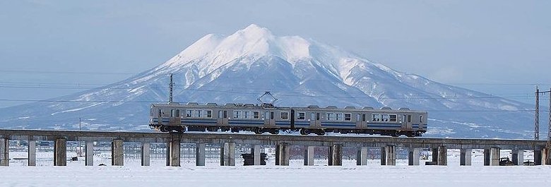 Konan Railway with Mount Iwaki, Aomori Prefecture, Japan