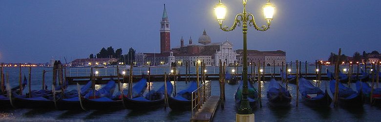 Parked gondolas with the Basilica of San Giorgio Maggiore