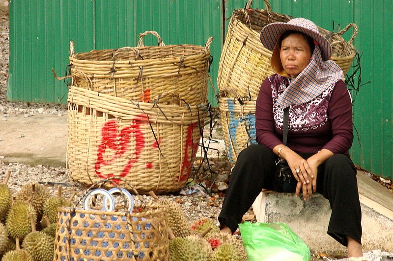 Durian seller at the market in Kep, Cambodia