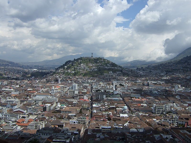 Statue of La Virgen del Panecillo with Quito spread out below it