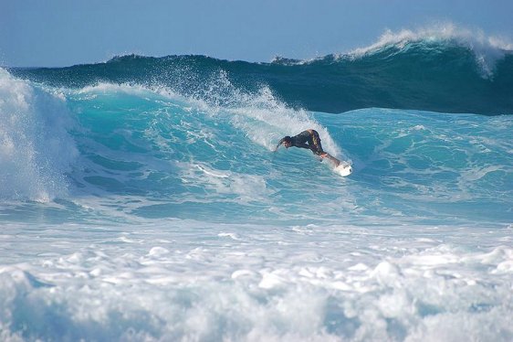 Surfing at Banzai Pipeline on the North Shore, Oahu