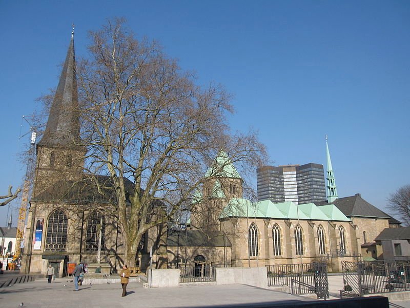 Church of St John the Baptist (left) with Essen Cathedral (right)