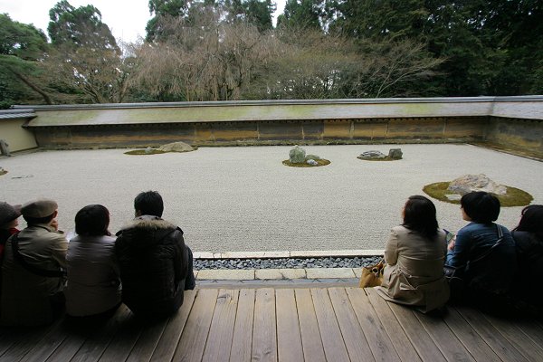 Contemplating the rocks at Ryoan-ji