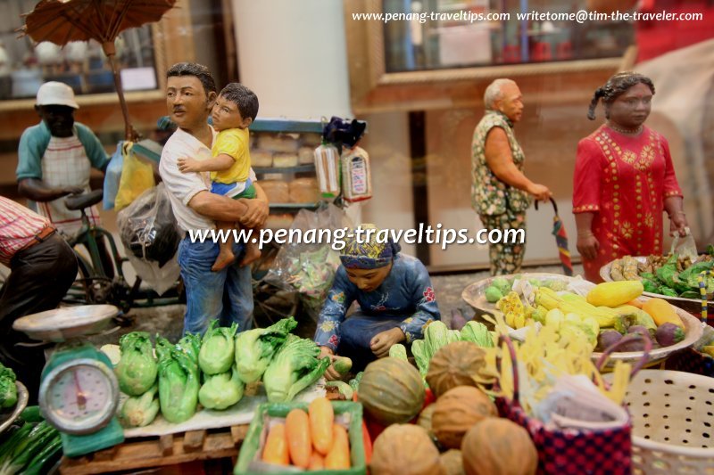 Buyers in front of the vegetable stall