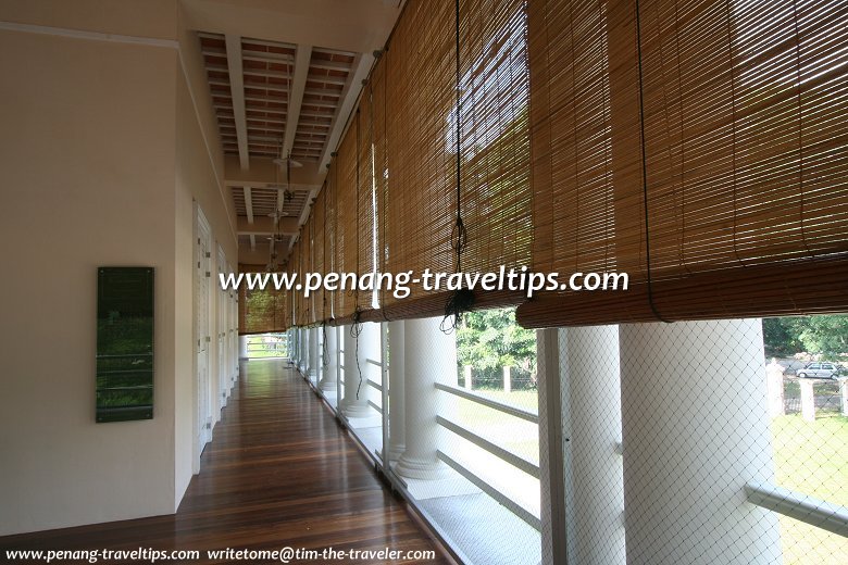 Blinds and netting provide some protecting to the colonnade at Suffolk House