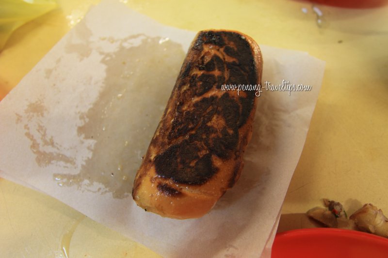 Charred salted-fish-filled bread