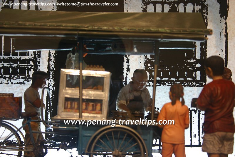 Ban Cien Koay seller surrounded by his customers