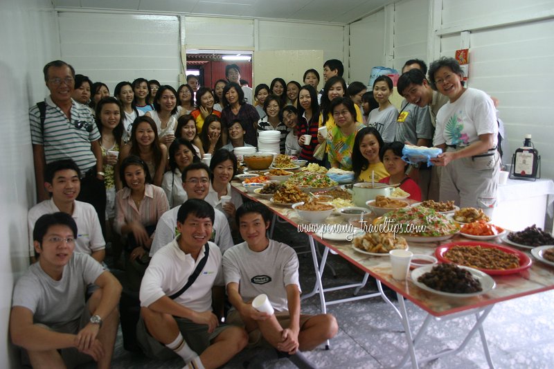 Visitors enjoying a feast at Chew Jetty